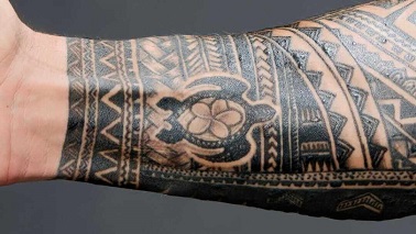 Roman Reigns turtle tattoo